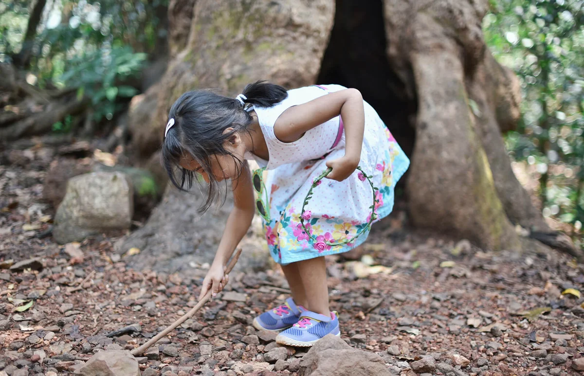 Cute Young girl exploring in the nature