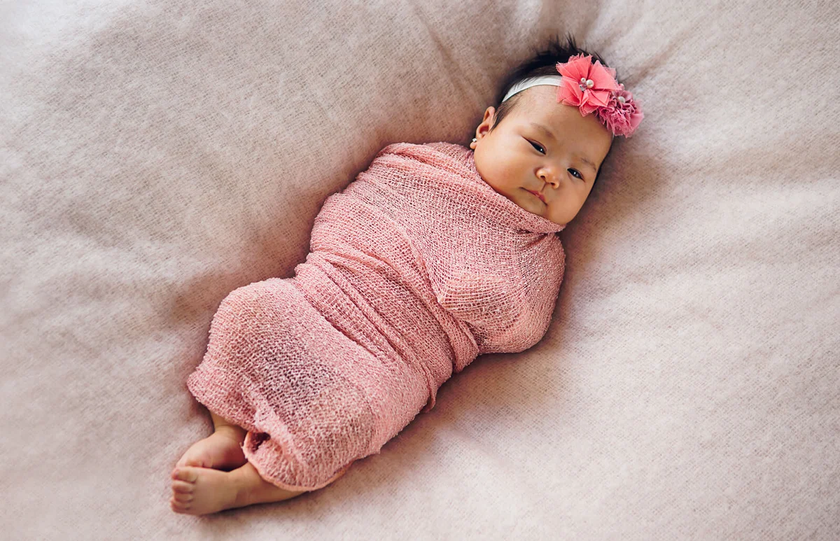 Baby girl newborn in pink