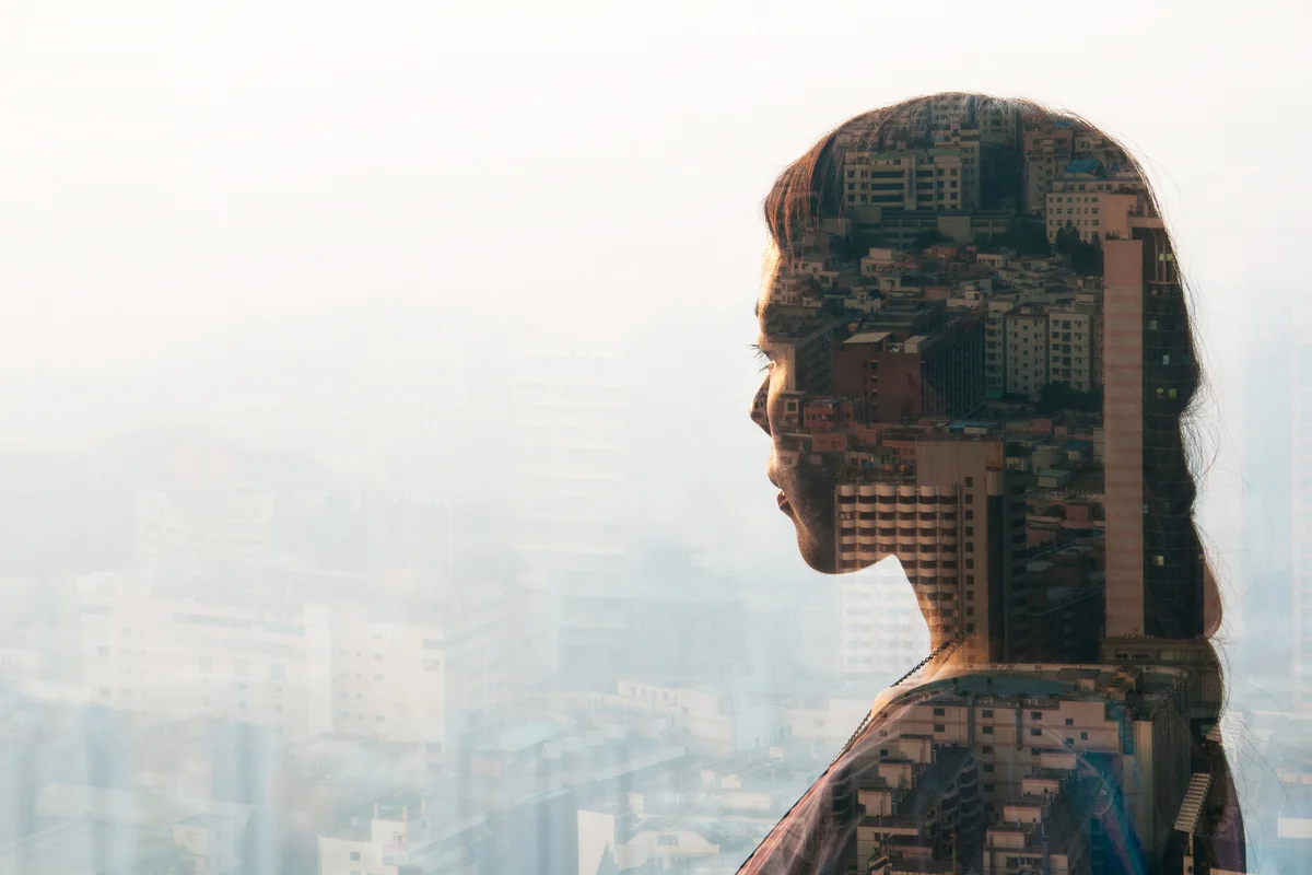 Woman looking at cityscape