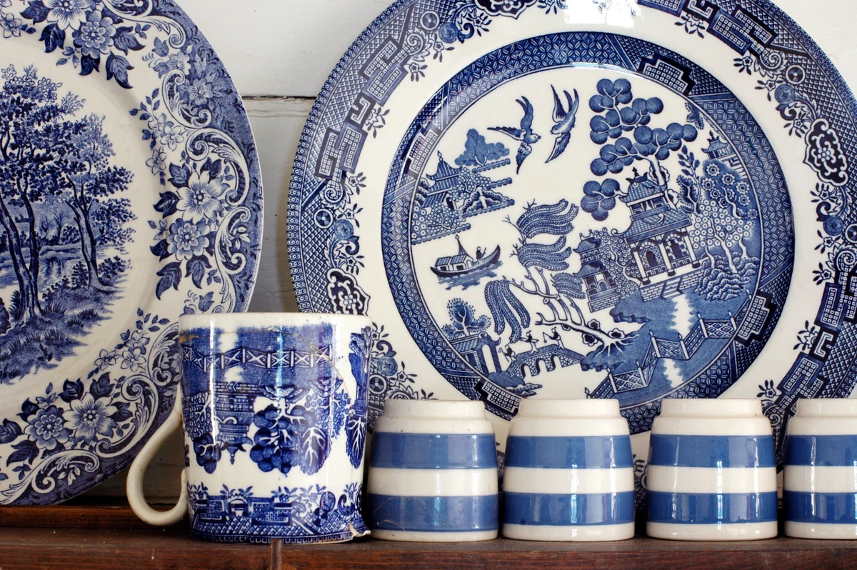Blue chinaware on old dresser