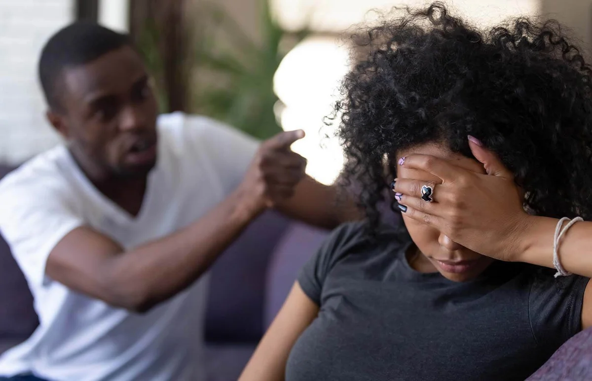 Tired wife ignoring angry husband blaming of problems