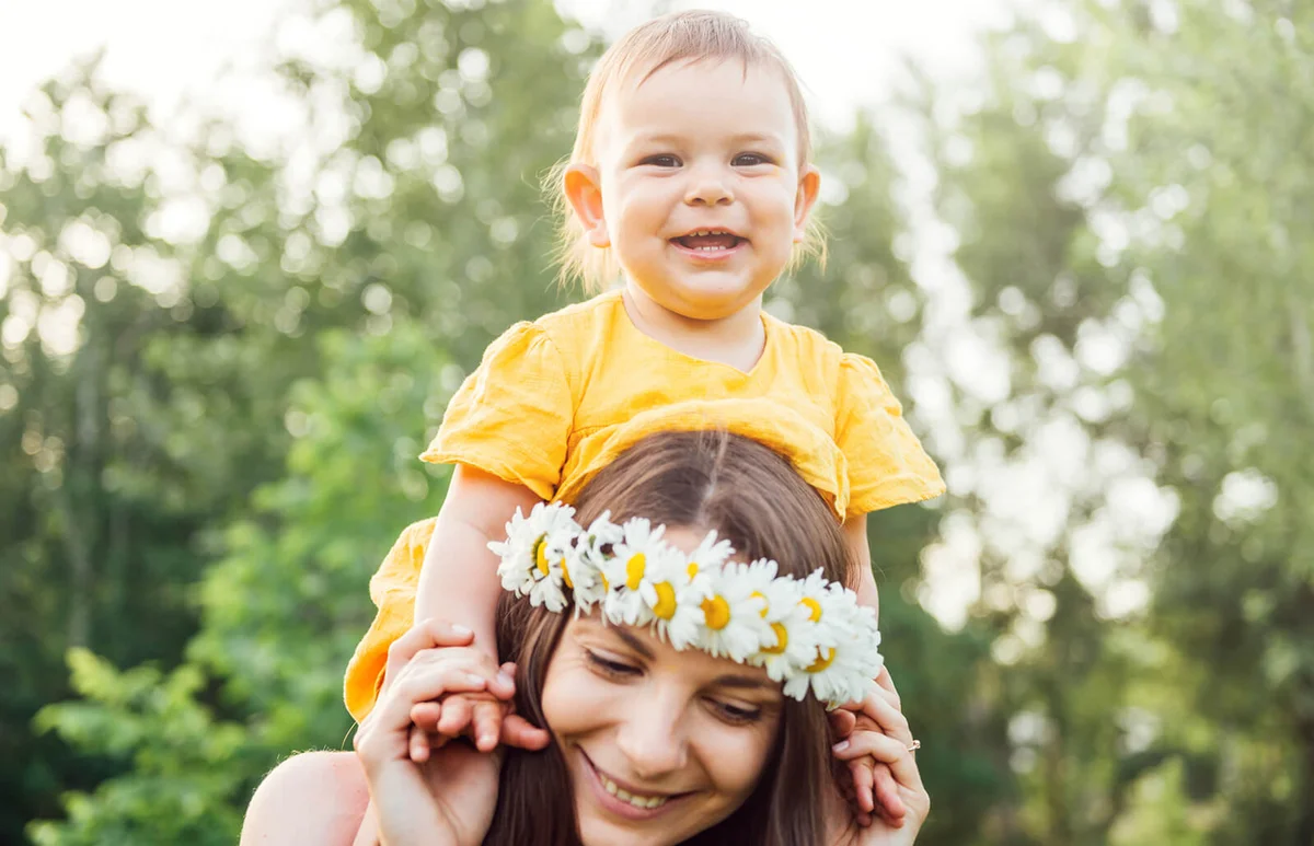 Hippie mother and happy baby