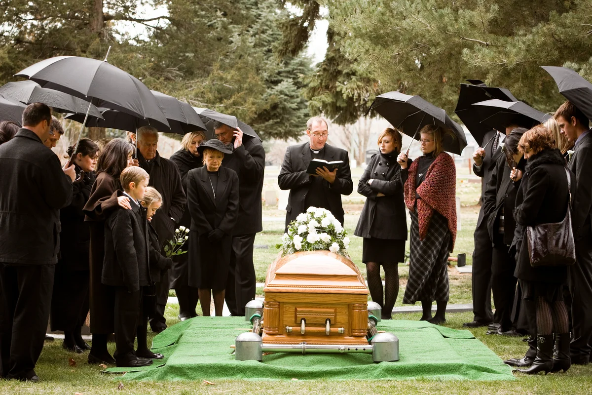 People attending a funeral