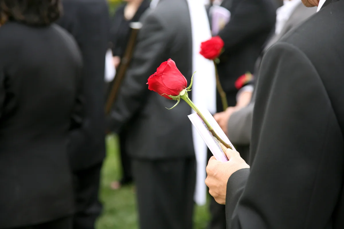 Attending a service dressed in black
