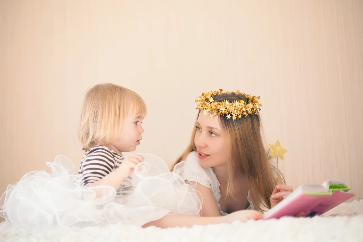 Mother and cute little girl dresses as fairies