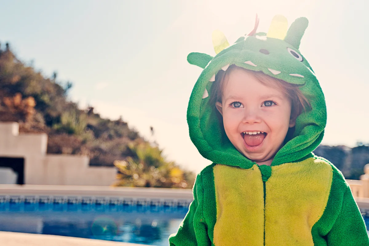 Cute Toddler in Dragon Costume