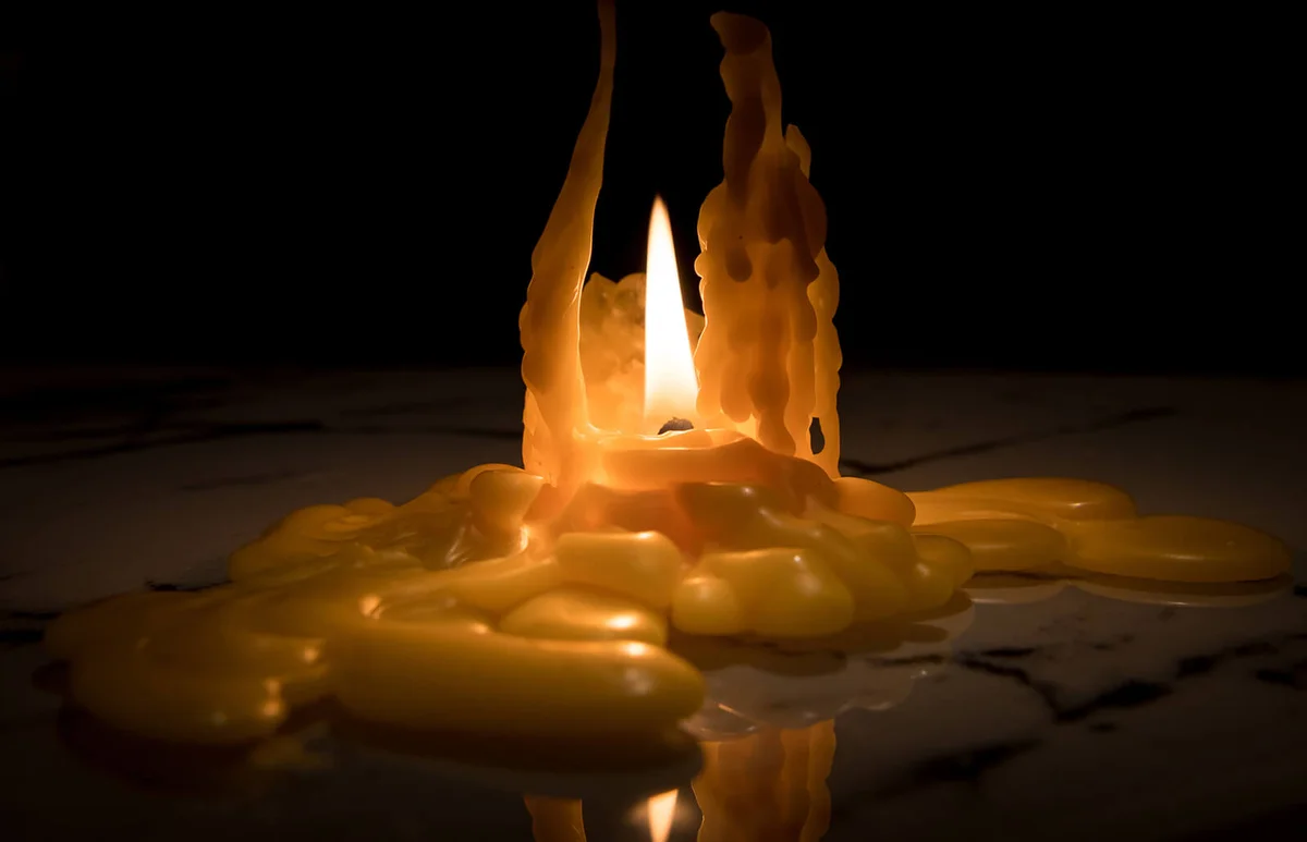 Closeup of a nearly burned down candle