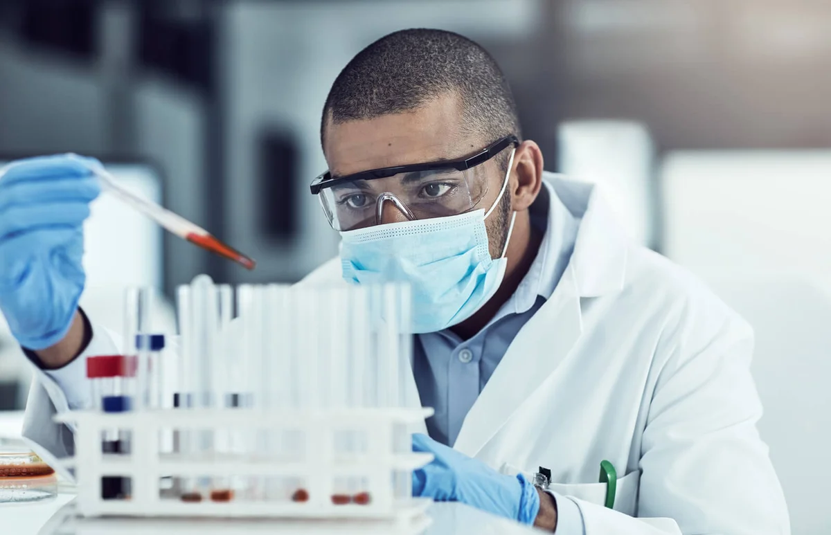 young male scientist working in his lab
