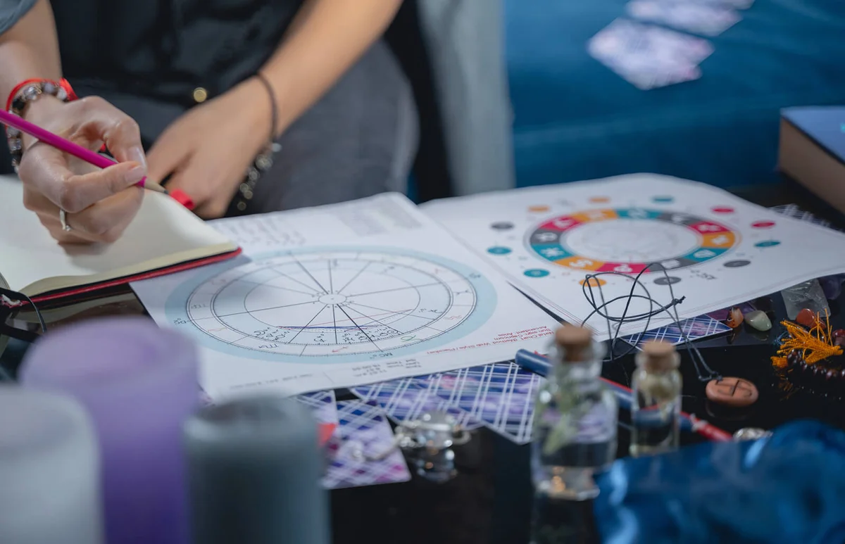 astrologer making a birth chart analysis
