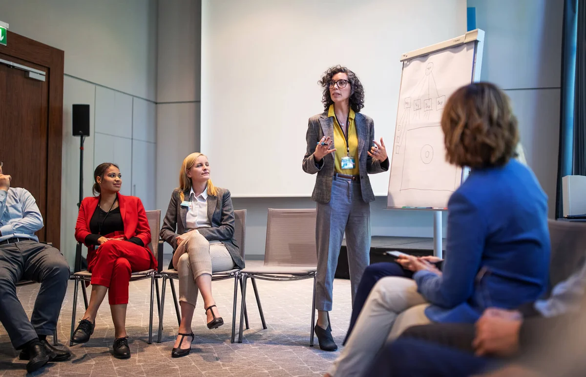 Businesswoman giving presentation during a seminar