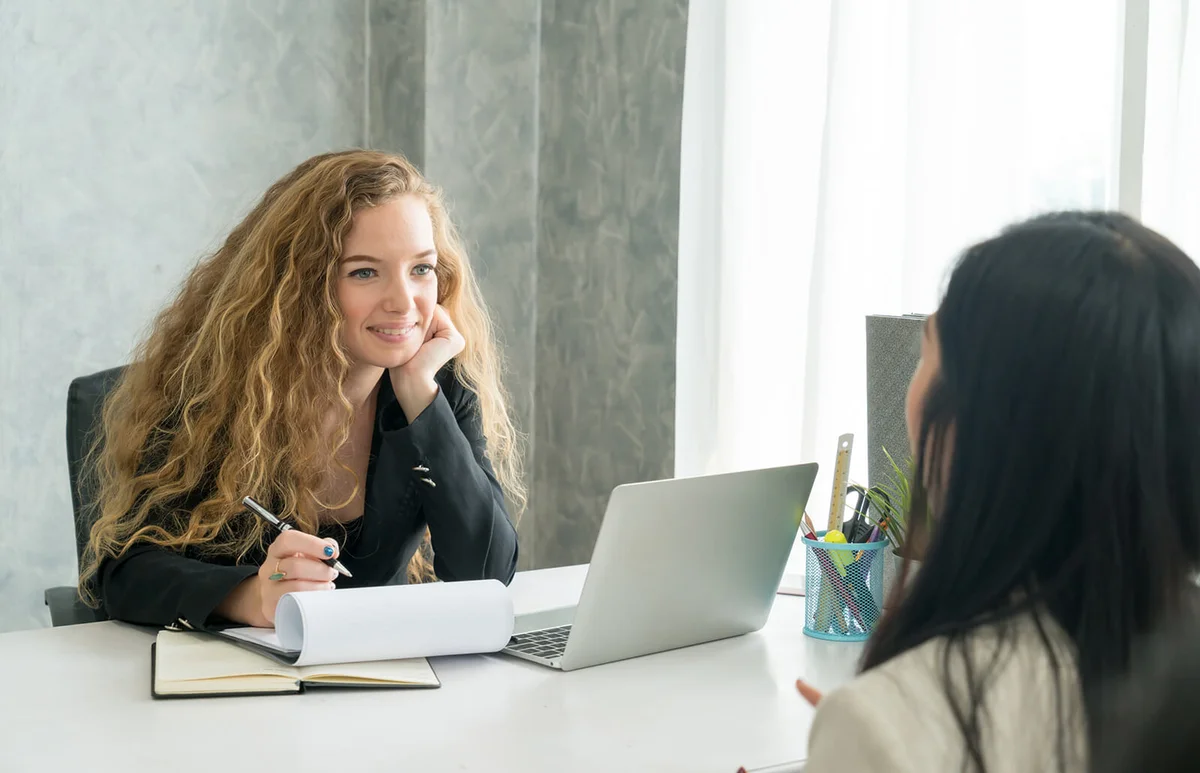 Businesswomen are meeting and interviewing in the company office