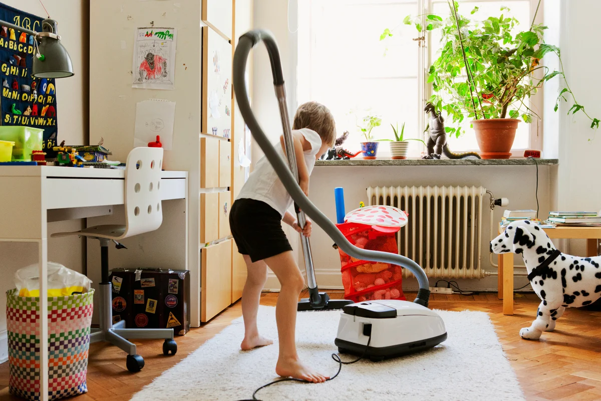 Boy hovering his room
