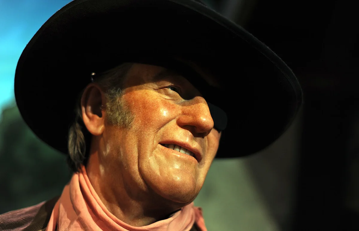A wax figure of actor John Wayne is seen at "The celebrity Awards Hall" exhibition at Madame Tussauds in Hollywood, California, on February 25, 2010 | Getty Editorial Use