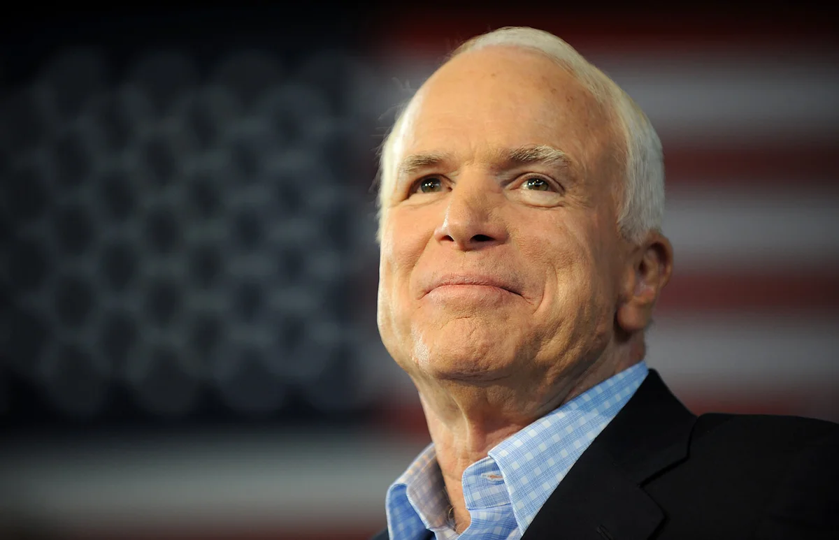 Republican presidential candidate John McCain pauses while addressing a campaign event at the Freedom Hill Ampitheatre in Sterling Heights, Michigan | Getty Editorial Use
