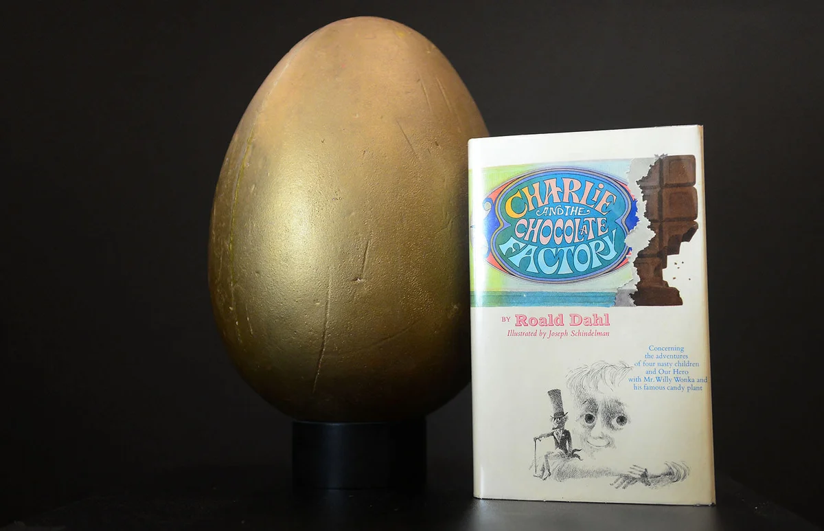 The first edition book 'Charlie and the Chocolate Factory' and the original hero Golden Egg from the film "Willy Wonka and the Chocolate Factory" on display at Profiles In History in Calabasas | Getty Editorial Use