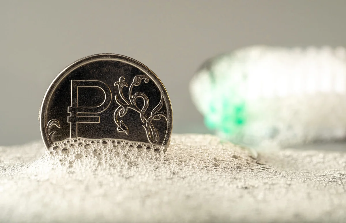 rouble metal coin in the suds