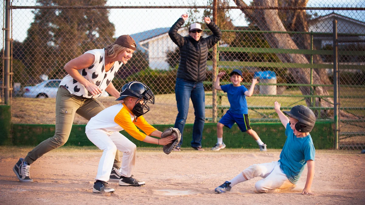 Family playing baseball