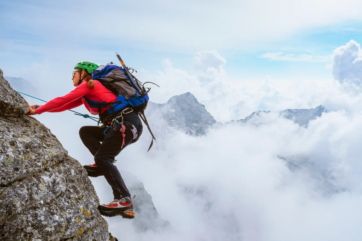 Female climber on a rocky wall