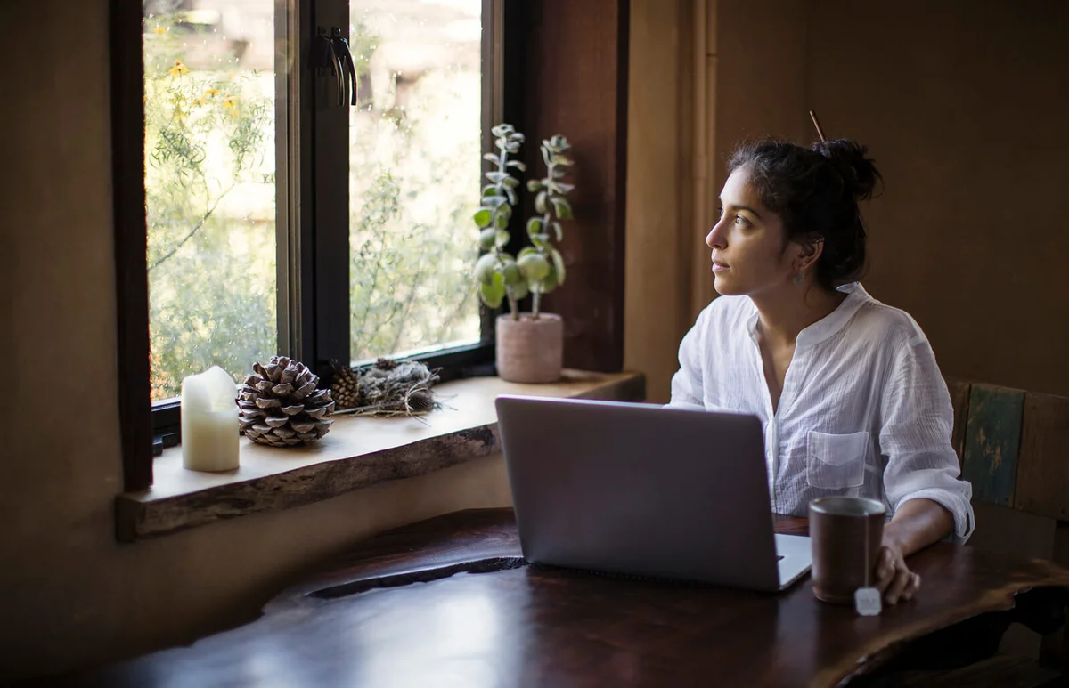 Young woman working at home
