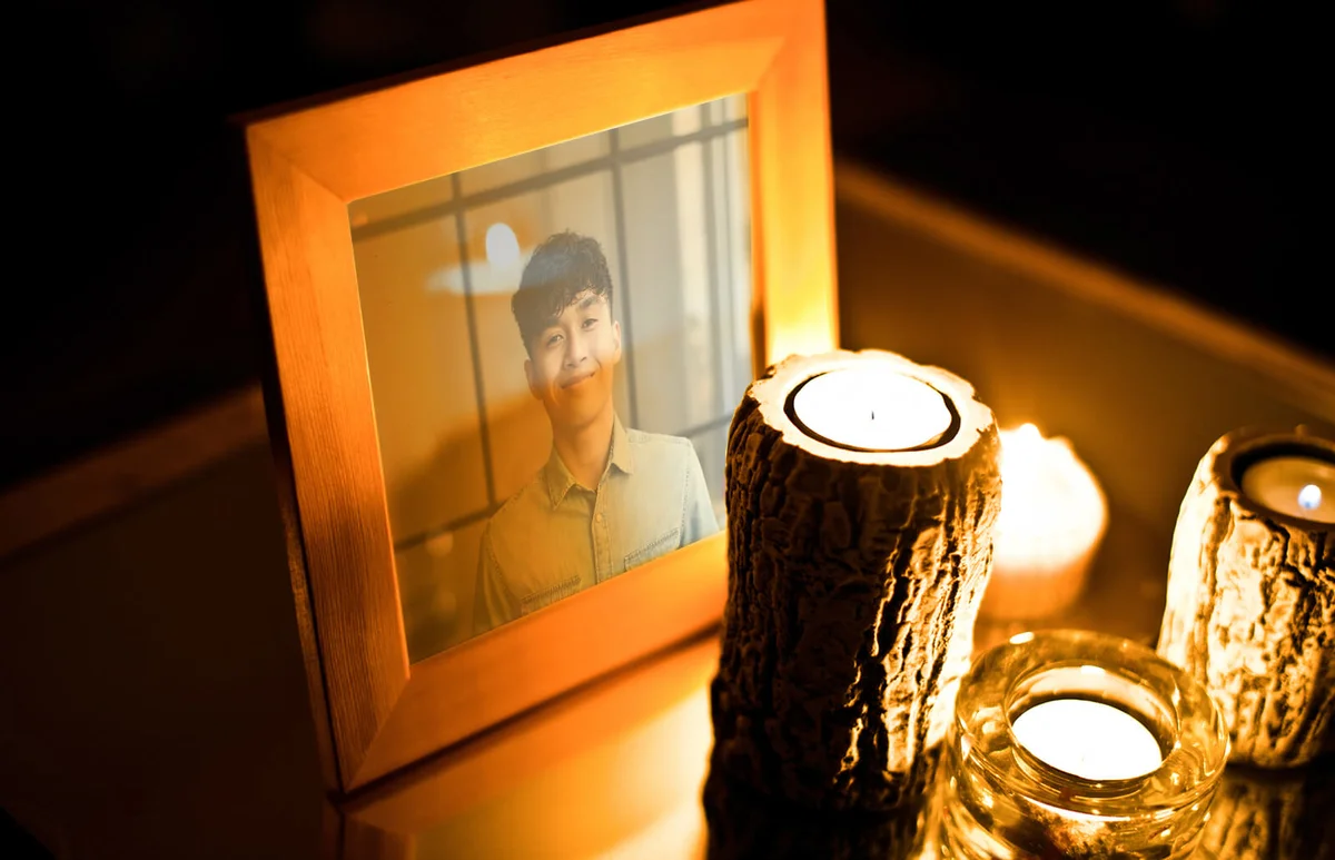 Lit candles in the dark