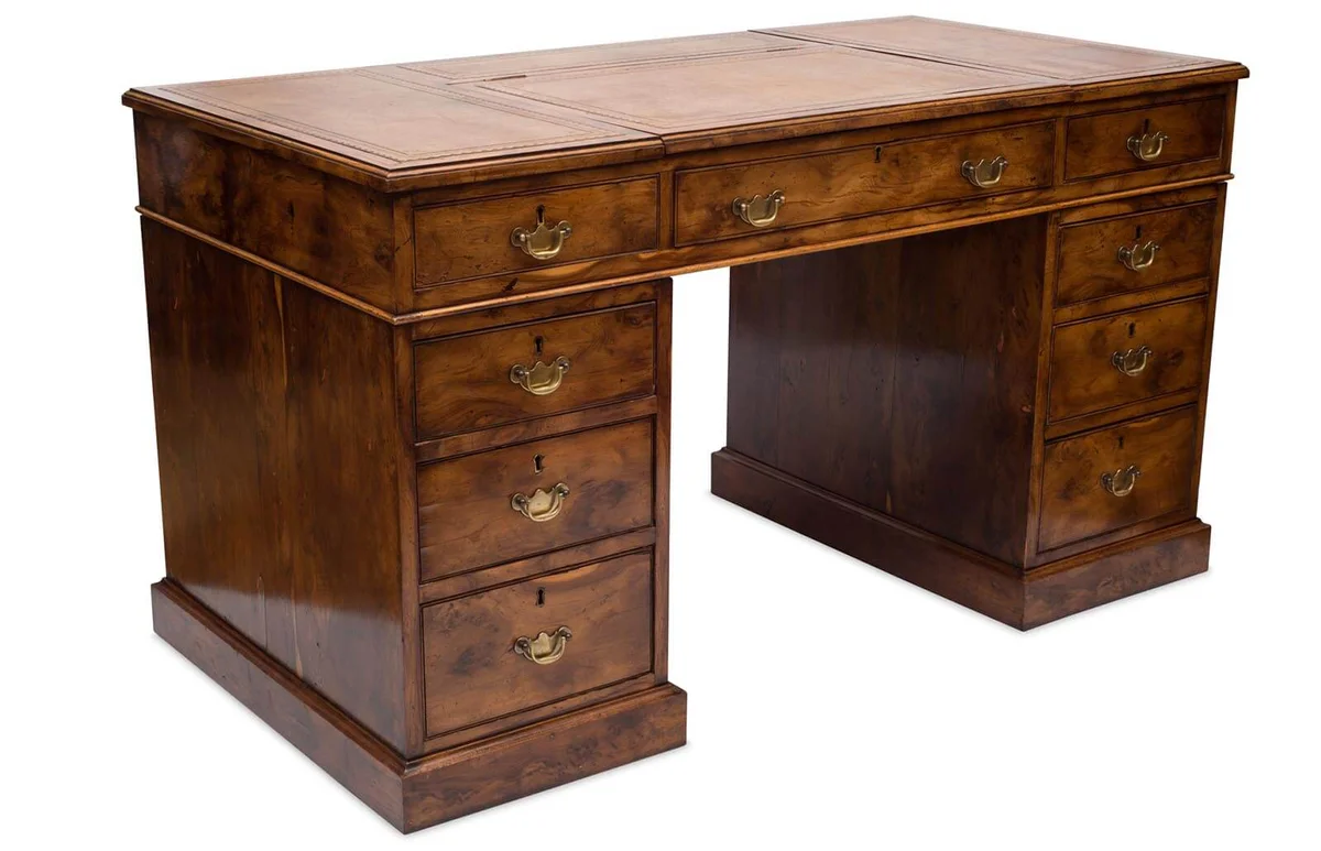 An antique solid wood, nine-drawer pedestal desk