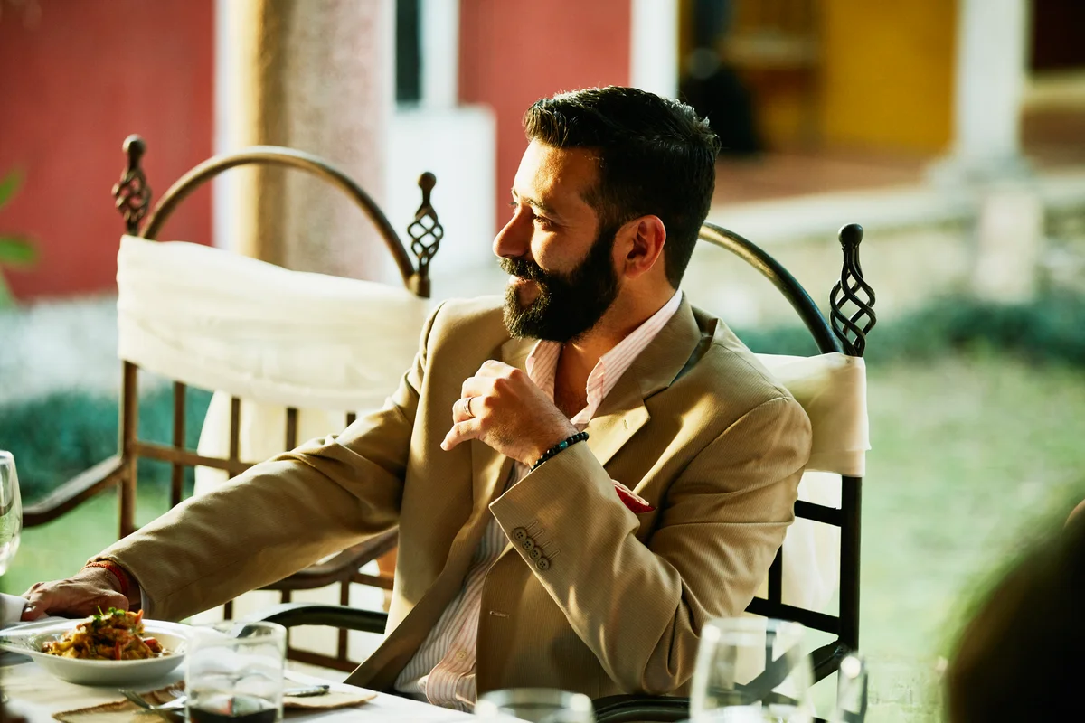 Man in casual sports coating informal outdoor dinner