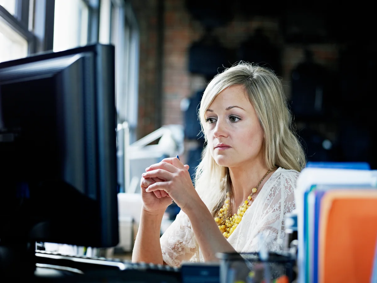 Woman looking at computer