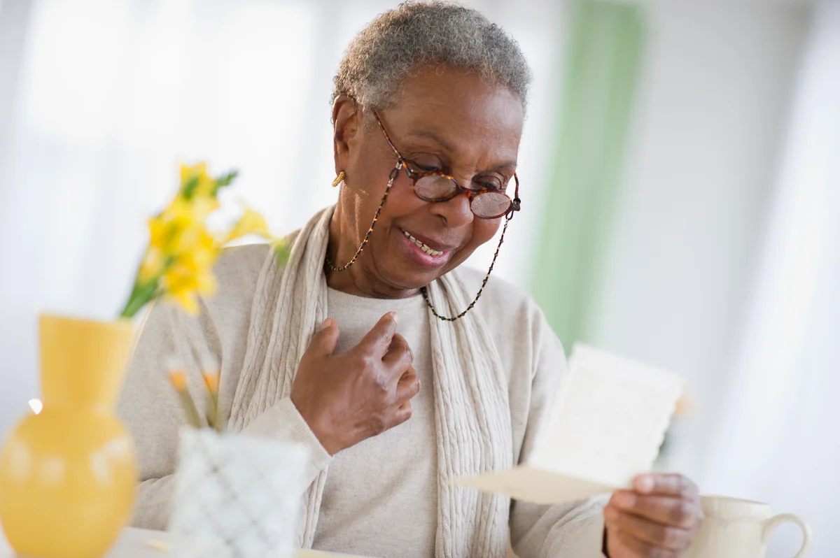 Woman touched by card message