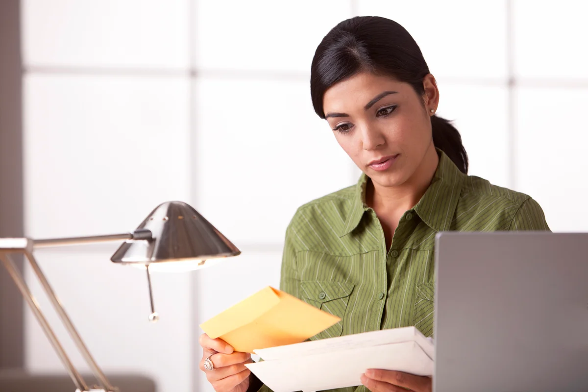 Woman looking at mail