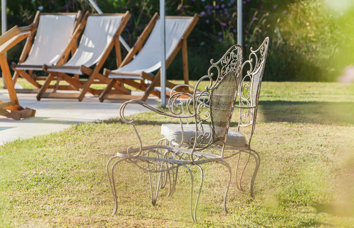Wrought iron chairs in backyard