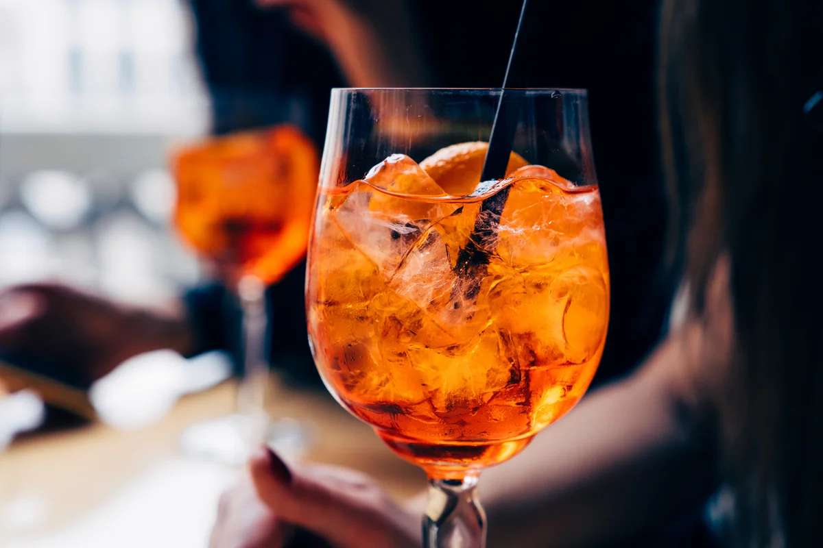 Two women with Spritz drinks