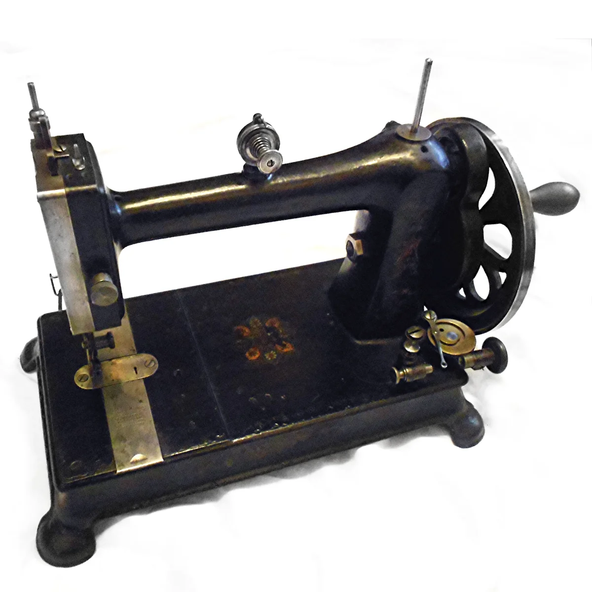 A rare Davis domestic vertical feed sewing machine on a cast iron base, produced around 1890