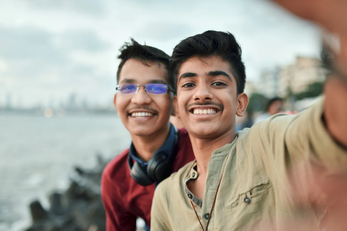 Brothers taking a selfie together