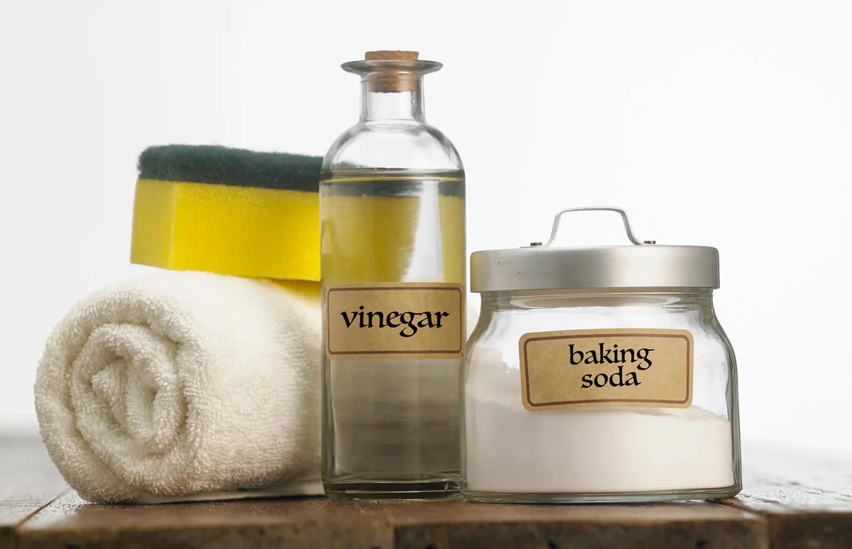 Close-up of baking soda and vinegar on table