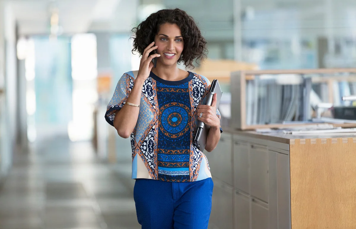 female working in small modern business office