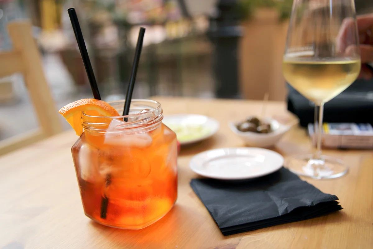 Coconut Spritz and wine on a table