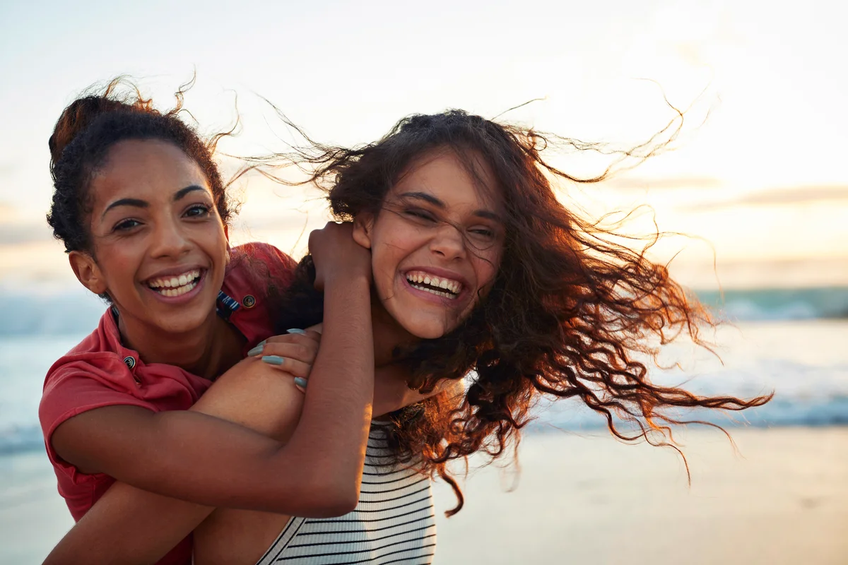 Young women hanging out at the beach