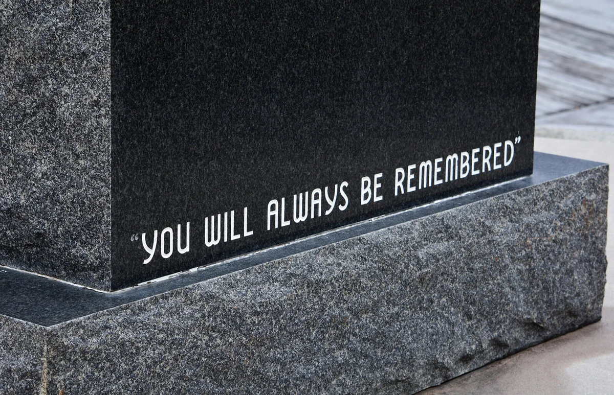 Stone marker with the words: "You Will Always Be Remembered"