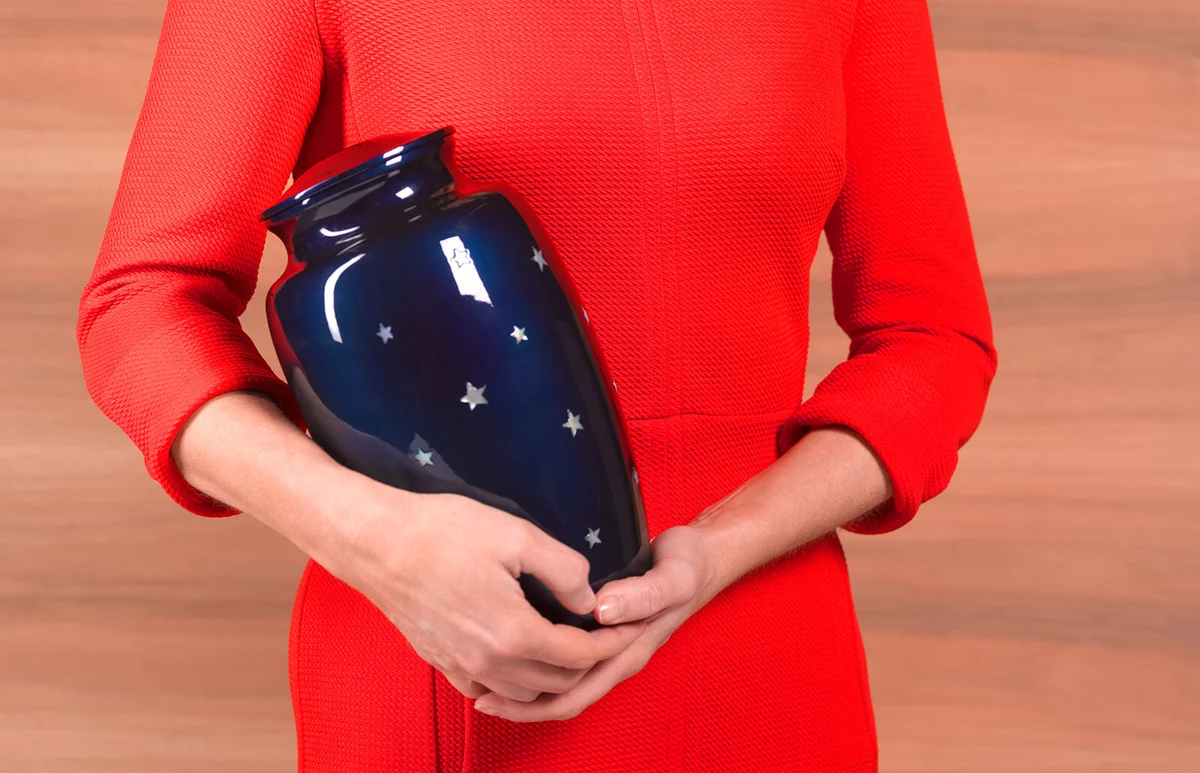 Woman with Funeral Urn