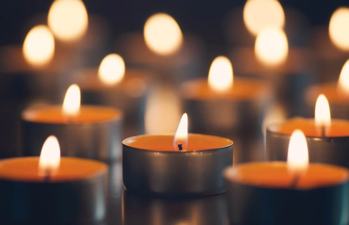 Small orange candles lit