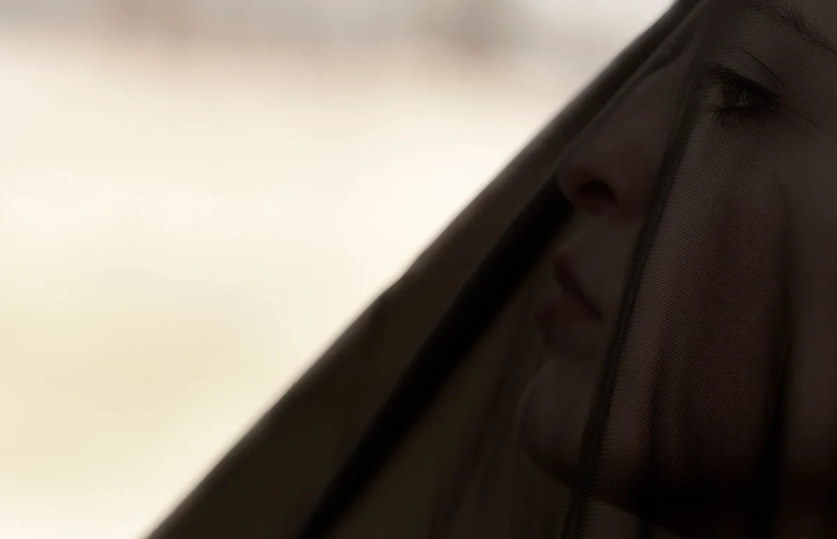 Portrait of veiled woman