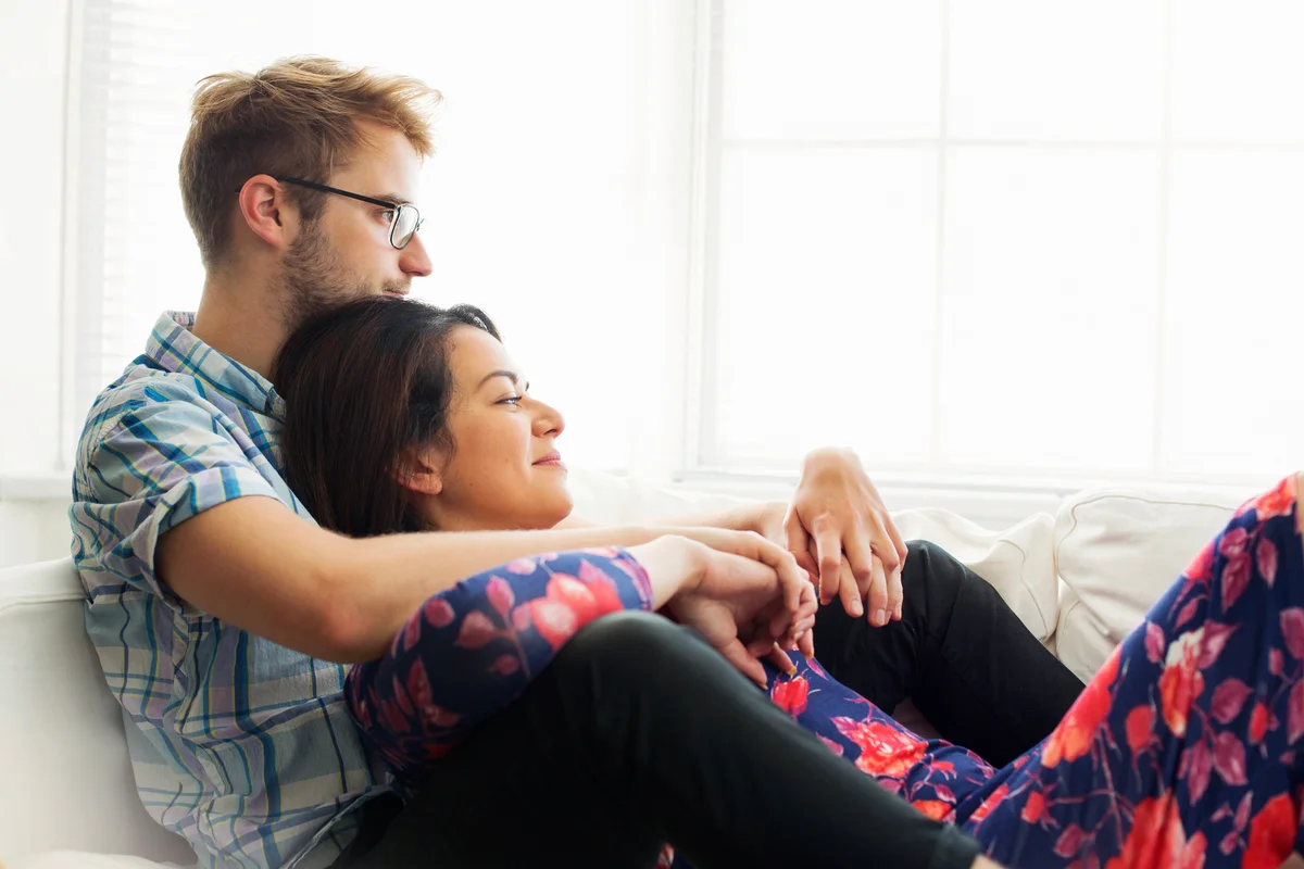Young couple relaxing at home