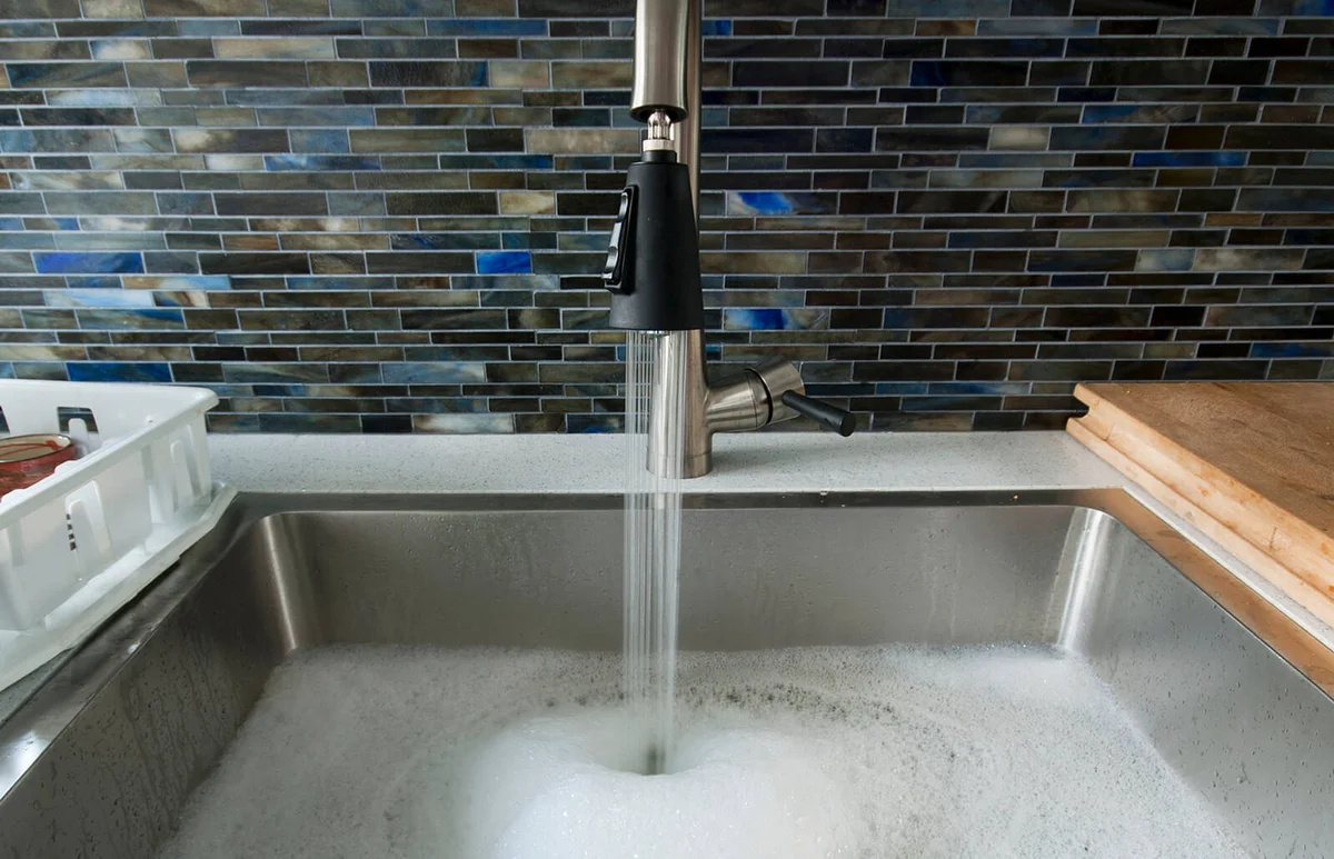 Kitchen sink with soapy water