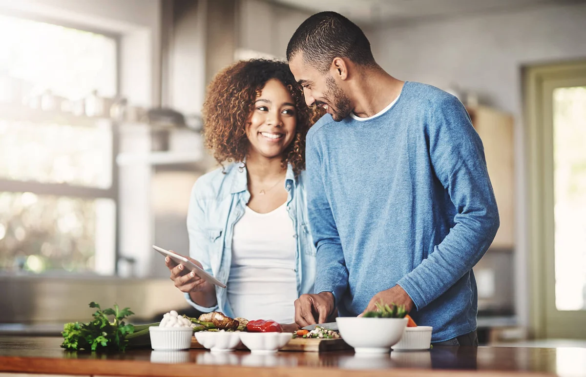 Couple cooking toguether