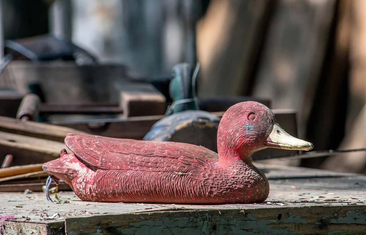 Old duck decoy for sale at a salvage yard