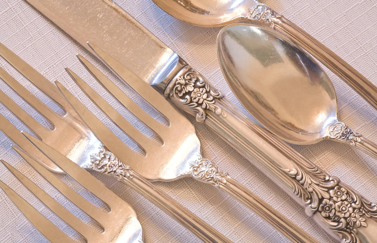 antique silverware place setting