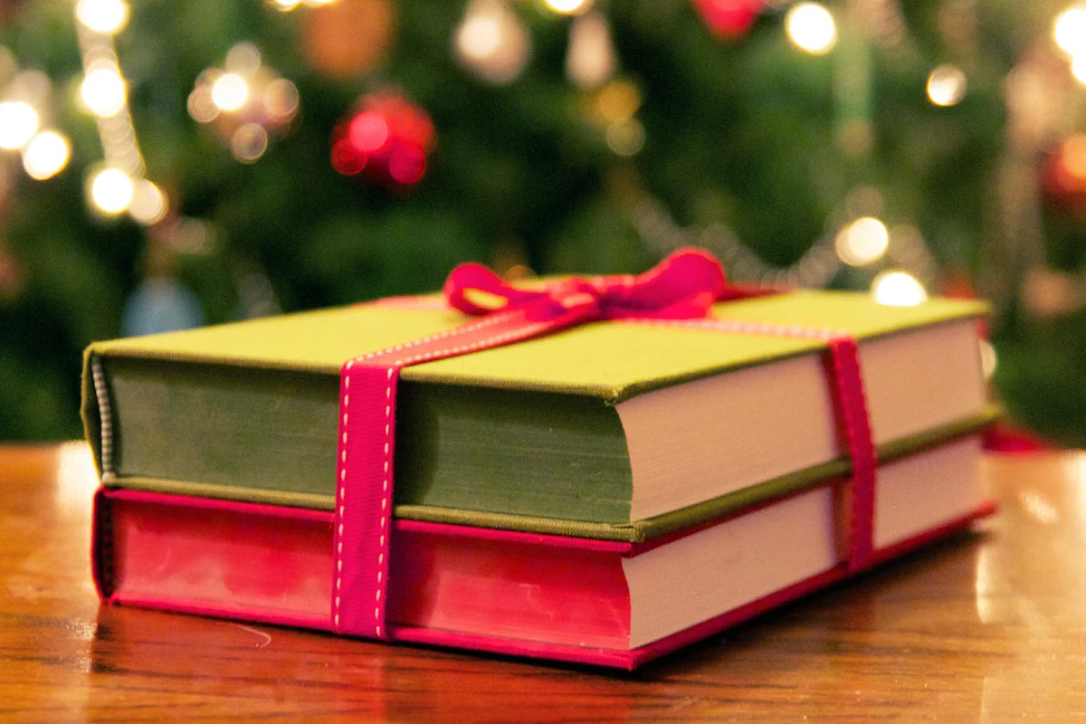 Books wrapped in red ribbon