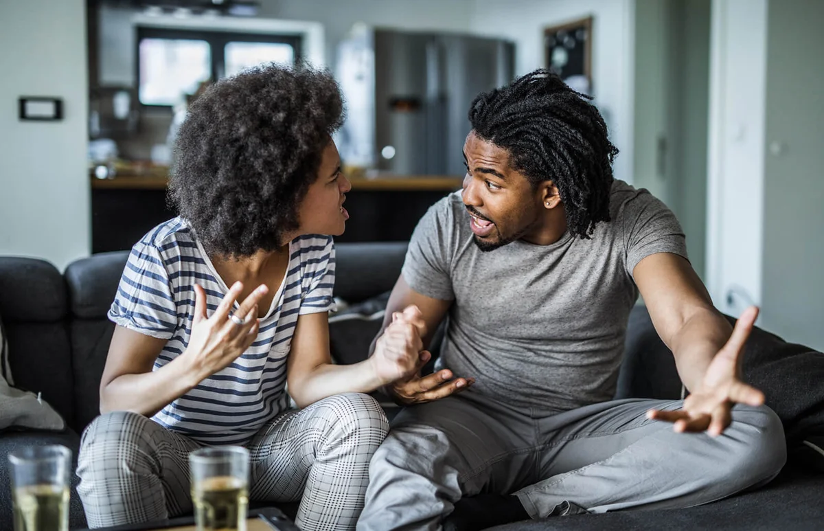 couple arguing in the living room