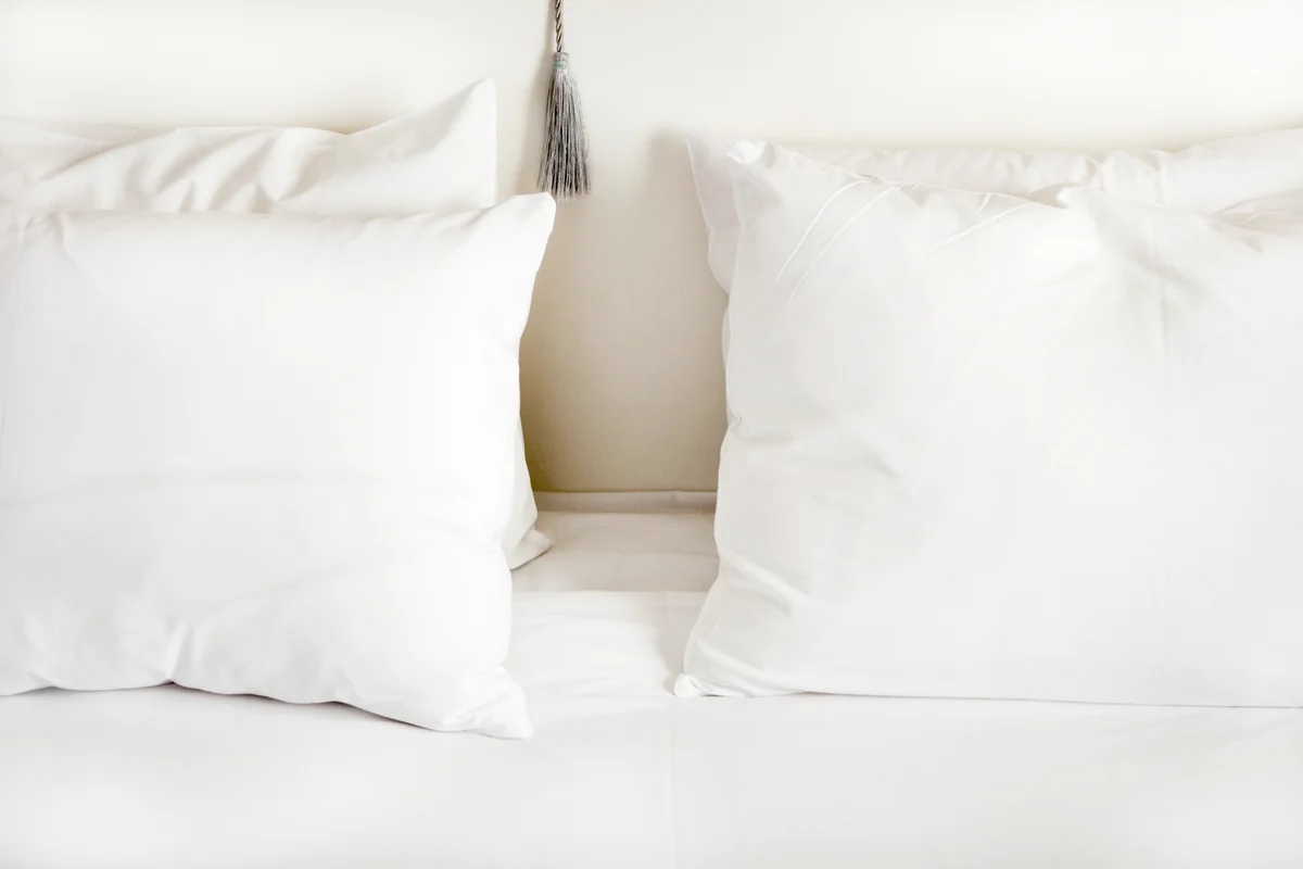 White pillows on bed