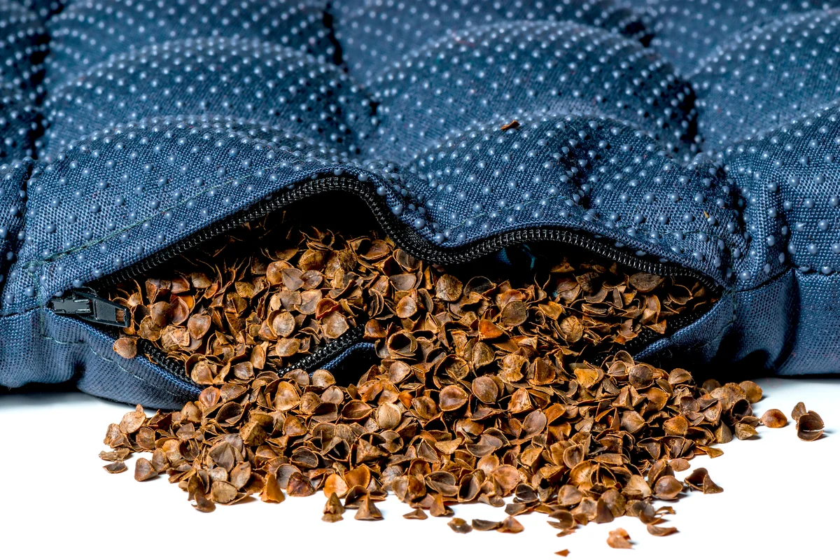Seating cushion filled with buckwheat husk